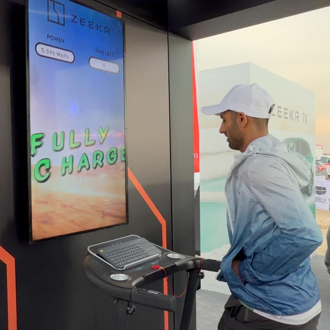 Interactive Treadmill Activation in Dubai: Participants generating human power to recharge EV cars